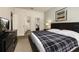 Serene bedroom includes a bed, dresser, and a doorway that leads to another room at 5360 Diplomat Ct # 107, Kissimmee, FL 34746