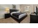 Comfortable bedroom featuring a queen bed, cozy textiles, and plenty of natural light at 5360 Diplomat Ct # 107, Kissimmee, FL 34746