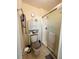 Updated bathroom with glass shower and storage at 5674 Sycamore Canyon Dr, Kissimmee, FL 34758