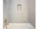 Close-up of the tiled shower and tub at 5701 Crestview Dr, Lady Lake, FL 32159