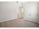Light and bright bedroom with wood-look floors and closet at 5701 Crestview Dr, Lady Lake, FL 32159
