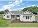Charming single-story home with a manicured front yard, tidy landscaping, and neutral exterior paint at 5701 Crestview Dr, Lady Lake, FL 32159