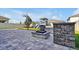 The backyard features paver patio, basketball hoop, playground, and stone fire pit at 580 Seattle Slew Dr, Davenport, FL 33837