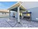 Covered patio featuring ceiling fan, seating, and paver flooring at 580 Seattle Slew Dr, Davenport, FL 33837