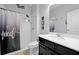 Clean bathroom with a shower, toilet, and a vanity with a mirror at 580 Seattle Slew Dr, Davenport, FL 33837