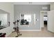 Bedroom/office combo featuring exercise bike, desk and neutral wall color at 580 Seattle Slew Dr, Davenport, FL 33837
