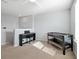 Upstairs bonus room featuring a piano, foosball table and neutral carpet at 580 Seattle Slew Dr, Davenport, FL 33837