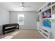 Bonus room with custom built-ins, foosball table, and entertainment center at 580 Seattle Slew Dr, Davenport, FL 33837