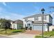 Attractive two-story home with a two-car garage and landscaped front yard at 580 Seattle Slew Dr, Davenport, FL 33837