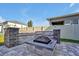 Stone fire pit sitting on paver patio, perfect for outdoor gatherings and cozy evenings at 580 Seattle Slew Dr, Davenport, FL 33837