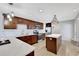 Bright kitchen featuring stainless appliances, white countertops, dark cabinets, and an island at 6845 Old Melbourne Hwy, St Cloud, FL 34771