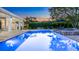 The backyard features a pool, spa, lounge chairs, fire pit, and green landscaping at 6845 Old Melbourne Hwy, St Cloud, FL 34771