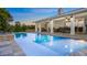 The backyard showcases a large pool and outdoor living space, great for entertainment at 6845 Old Melbourne Hwy, St Cloud, FL 34771