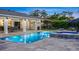 Backyard pool with a spa, outdoor grill area, and covered porch perfect for entertainment at 6845 Old Melbourne Hwy, St Cloud, FL 34771