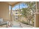 Relaxing balcony with comfortable seating and scenic views of the surrounding landscape at 7671 Comrow St # 303, Kissimmee, FL 34747