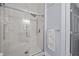 Modern bathroom featuring a large walk-in shower with marble tiling at 7671 Comrow St # 303, Kissimmee, FL 34747