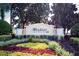 Beautiful landscaping surrounds the community sign, creating a welcoming and attractive entrance for residents at 7671 Comrow St # 303, Kissimmee, FL 34747