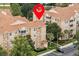 Beautifully landscaped condo complex with mature trees and well-maintained grounds at 7671 Comrow St # 303, Kissimmee, FL 34747