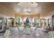 Relax in this cozy lounge area with comfortable seating, overhead fans, and access to outdoor amenities at 7671 Comrow St # 303, Kissimmee, FL 34747