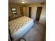 Bedroom featuring tiled floors, neutral paint, large closets and dresser at 777 W Lancaster Rd # A-13, Orlando, FL 32809