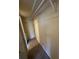 Walk-in closet with wire shelving and tile flooring provides ample storage at 777 W Lancaster Rd # A-13, Orlando, FL 32809