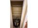 Shelved utility closet with water heater inside unit for convenience at 777 W Lancaster Rd # A-13, Orlando, FL 32809