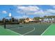 Outdoor basketball court with palm trees perfect for sports enthusiasts and recreation at 8961 California Palm Rd, Kissimmee, FL 34747