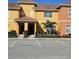 Beautiful townhome with lush landscaping and reserved parking in a desirable community at 8961 California Palm Rd, Kissimmee, FL 34747