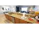 Spacious kitchen with granite countertops, modern appliances, and plenty of counter space at 8961 California Palm Rd, Kissimmee, FL 34747