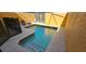 Private pool is perfect for relaxation or a refreshing dip, surrounded by yellow walls at 8961 California Palm Rd, Kissimmee, FL 34747