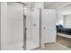 Tiled walk-in shower with glass door in a modern bathroom at 956 Cambridge Dr, Winter Haven, FL 33881