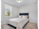 Cozy bedroom with neutral carpet and a window at 956 Cambridge Dr, Winter Haven, FL 33881