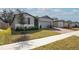 Charming single-story home with well-manicured lawn and brick paver driveway at 956 Cambridge Dr, Winter Haven, FL 33881