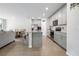 Modern kitchen with stainless steel appliances and large island at 956 Cambridge Dr, Winter Haven, FL 33881