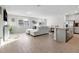 Bright living room with modern furnishings and lots of natural light at 956 Cambridge Dr, Winter Haven, FL 33881