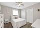 Bedroom with a ceiling fan and plenty of natural light at 6845 Old Melbourne Hwy, St Cloud, FL 34771