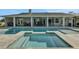 Backyard pool with covered sitting area and outdoor dining at 6845 Old Melbourne Hwy, St Cloud, FL 34771