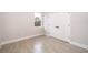 Bedroom featuring tile flooring and a double door closet and window at 12691 Sw 33Rd Ave, Ocala, FL 34473