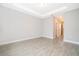 Bright living room featuring recessed lights, tile floors and neutral colored walls at 12691 Sw 33Rd Ave, Ocala, FL 34473