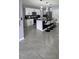 Kitchen featuring gray countertops, white cabinets and stainless appliances at 1292 Cascades Ave, Davenport, FL 33837