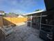 This is a view of the home's screened patio with access to a fenced backyard at 1324 Eagle Ln, Winter Garden, FL 34787