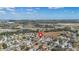 Panoramic aerial view of a residential area near lakes showcasing the house's location at 1520 Oak Hill Trl, Kissimmee, FL 34747