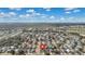 Aerial view of a residential area showcasing the house in a suburban neighborhood at 1520 Oak Hill Trl, Kissimmee, FL 34747