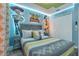 Fun 'Toy Story' themed bedroom with LED lighting, unique decor and furnishings, with an eye-catching, custom design at 1520 Oak Hill Trl, Kissimmee, FL 34747