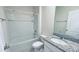 Full bathroom with a shower-tub combo, granite-topped vanity, and tile flooring at 1727 Buckeye Rd, Davenport, FL 33837