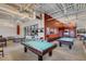 Recreation room featuring pool tables, ping pong, and lounging area at 208 Almeria Way, Davenport, FL 33837