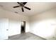 Bright main bedroom with ceiling fan, closet, and ensuite bathroom at 2523 Salzburg Loop, Winter Haven, FL 33884