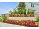 Inviting Cypress Cay community entrance with attractive landscaping and clear signage at 2595 Buena View Road, Kissimmee, FL 34746