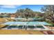 Aerial view of bocce ball courts with sunshades in a community park setting at 280 Del Sol Ave, Davenport, FL 33837