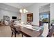 Dining room featuring an open floor plan with easy access to the living room and kitchen at 280 Del Sol Ave, Davenport, FL 33837